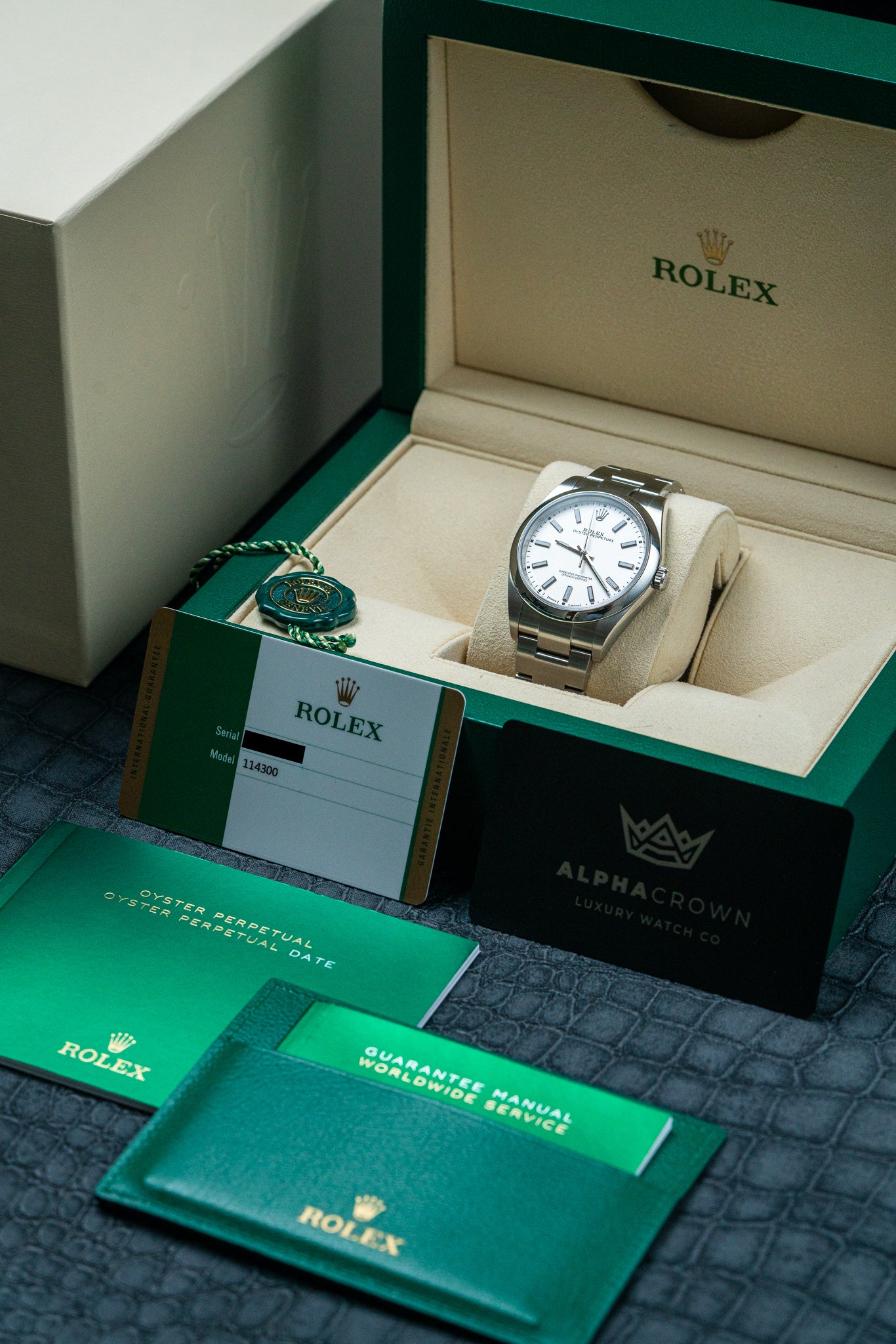 Rolex Oyster Perpetual 114300 | Preowned Rolex Watches – Alpha Crown